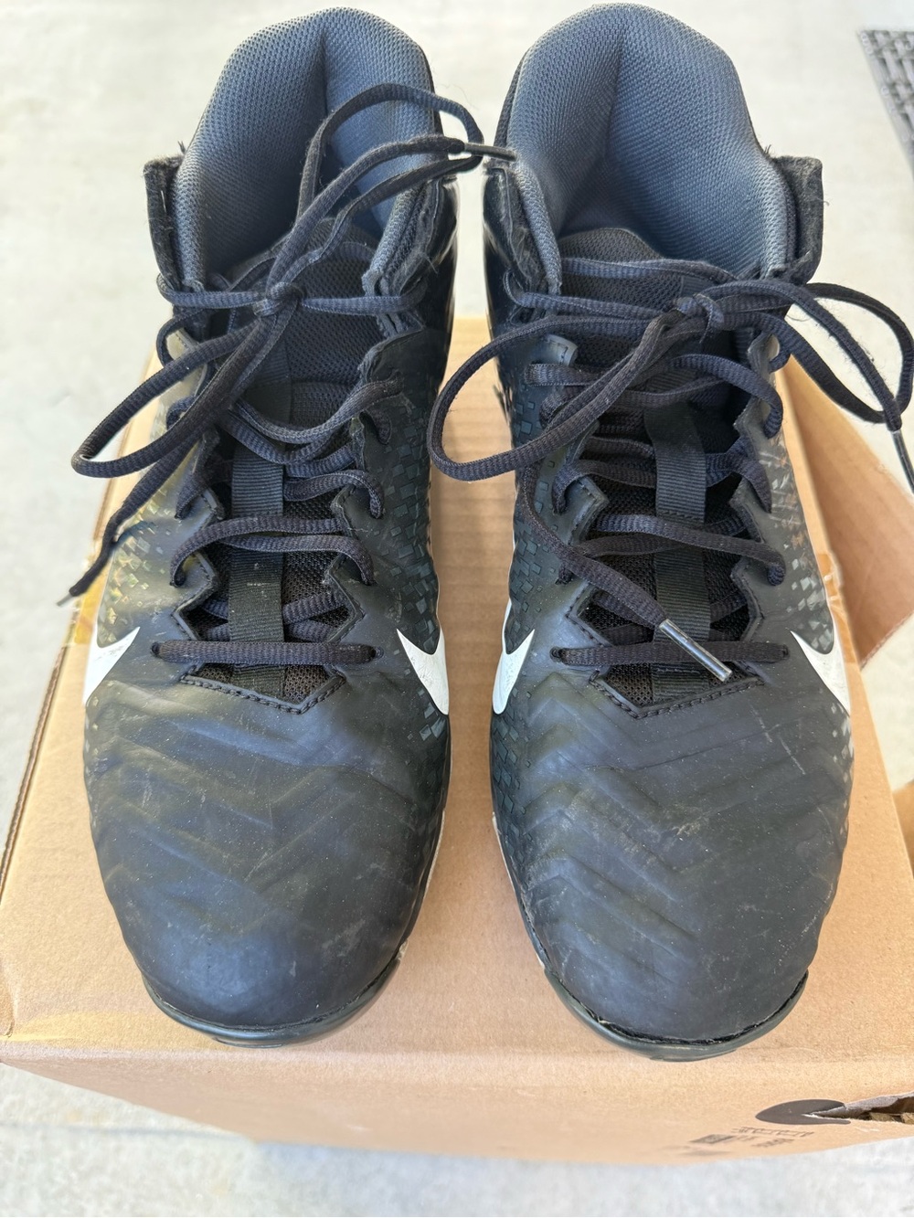 Nike Black and White High-Top ALPHA cleats